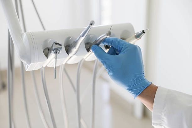 Professional Emergency Dentist technician working in Spring Grove, IL